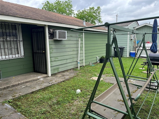view of yard with a wall mounted AC