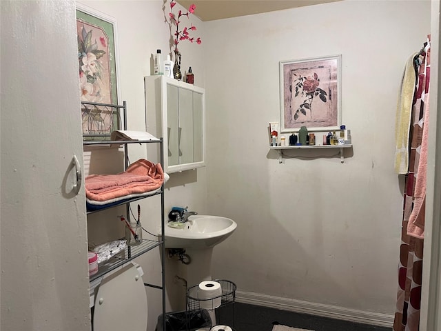 bathroom featuring baseboards