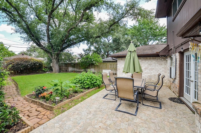 view of patio / terrace featuring french doors and outdoor dining space