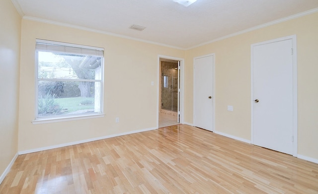 1915 Ashford Hollow Ln, Houston, TX 77077 - unfurnished bedroom with wood finished floors, crown molding, and connected bathroom