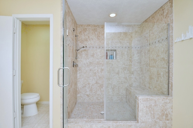 1915 Ashford Hollow Ln, Houston, TX 77077 - bathroom with a shower stall and tile patterned floors