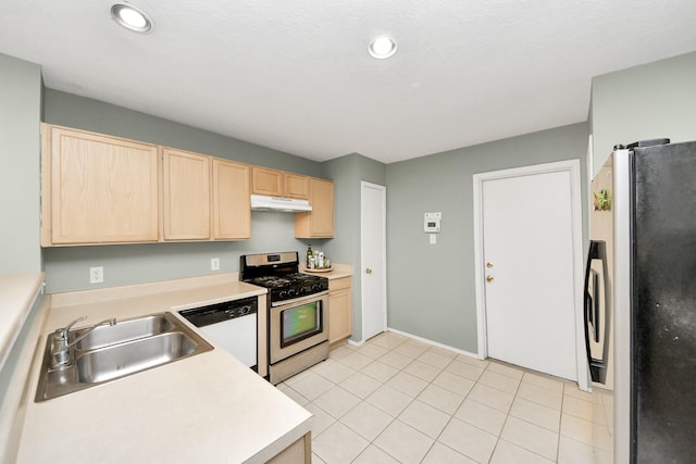 kitchen with refrigerator, dishwasher, gas stove, light brown cabinets, and under cabinet range hood