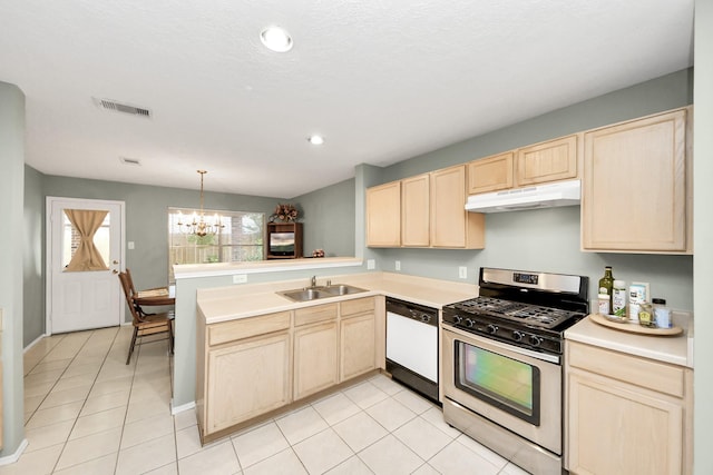 kitchen with stainless steel gas range, a sink, dishwasher, light brown cabinets, and under cabinet range hood