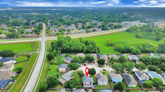 birds eye view of property with a residential view