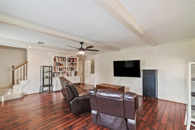 living area with crown molding, ceiling fan, stairway, and hardwood / wood-style floors