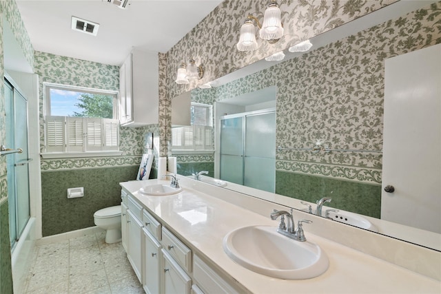 full bathroom with visible vents, a sink, and wallpapered walls