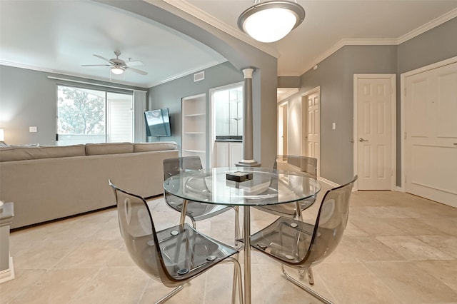 2111 Welch St Unit B117, Houston, TX 77019 - dining area featuring visible vents, a ceiling fan, ornate columns, and ornamental molding