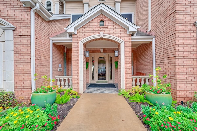 2111 Welch St Unit B117, Houston, TX 77019 - property entrance with brick siding and covered porch
