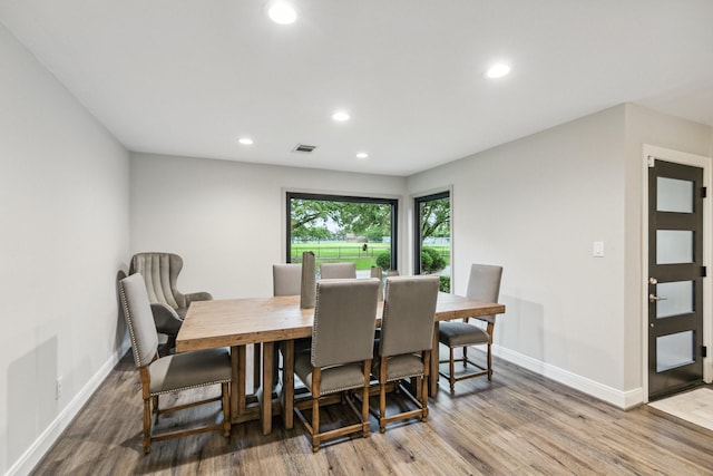dining space featuring recessed lighting, baseboards, visible vents, and wood finished floors