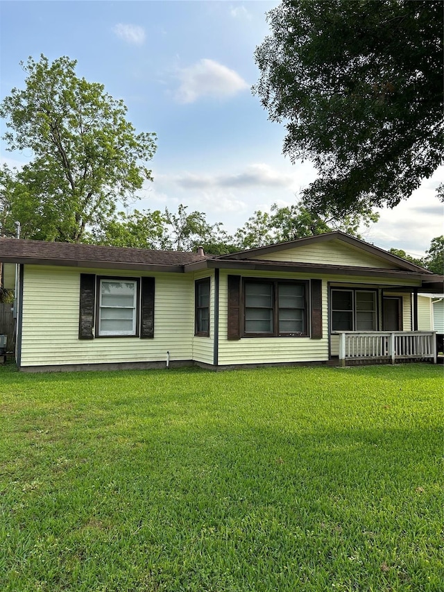 3411 Palm Ave, Texas City, TX 77590 - exterior space with a lawn