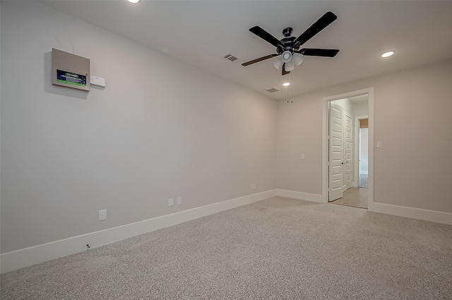 empty room featuring visible vents, recessed lighting, baseboards, and ceiling fan