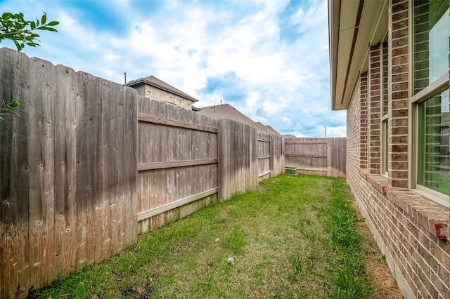 view of yard featuring a fenced backyard