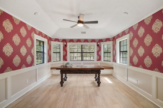 302 Tall Pines Dr, Magnolia, TX 77354 - office area with a wainscoted wall, a ceiling fan, light wood finished floors, and visible vents