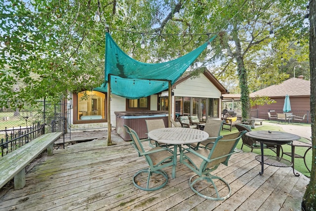 302 Tall Pines Dr, Magnolia, TX 77354 - wooden deck with fence, outdoor dining area, and a hot tub