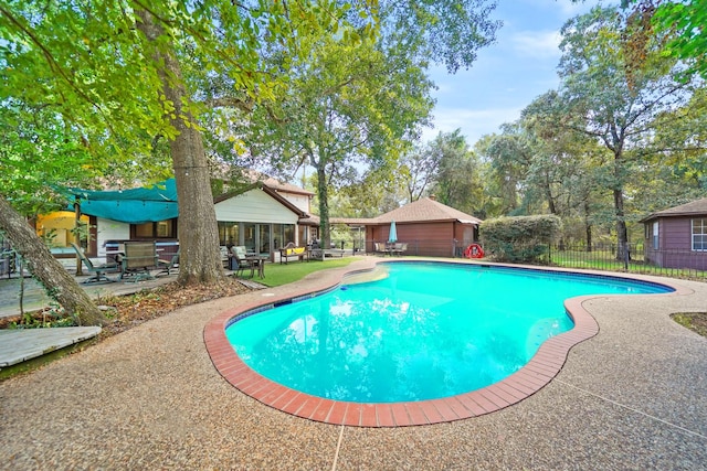 302 Tall Pines Dr, Magnolia, TX 77354 - view of swimming pool featuring a patio, fence, and a fenced in pool