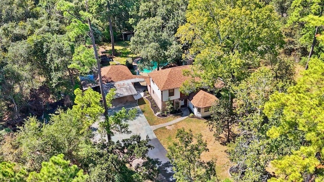 302 Tall Pines Dr, Magnolia, TX 77354 - drone / aerial view featuring a view of trees
