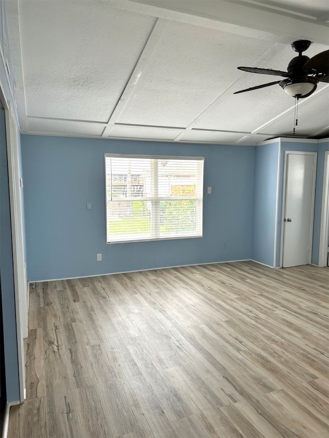 16717 Captain Hook, Jamaica Beach, TX 77554 - empty room with a ceiling fan and wood finished floors