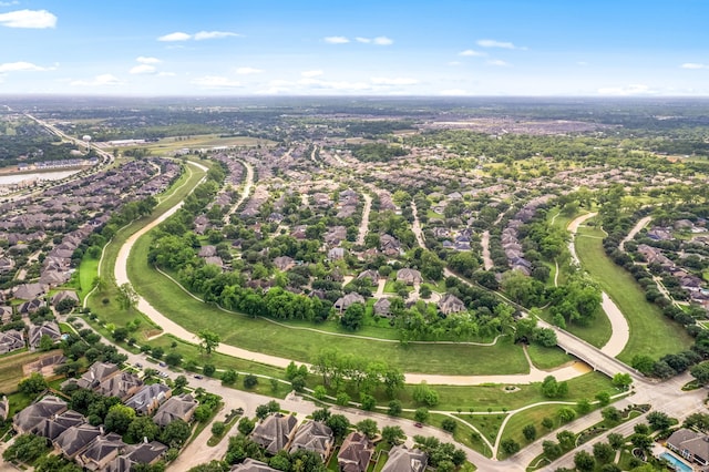 aerial view of property's location with nearby suburban area