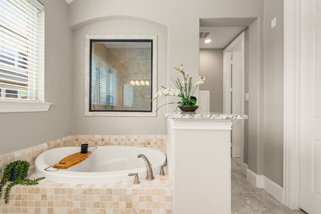 full bathroom featuring a garden tub