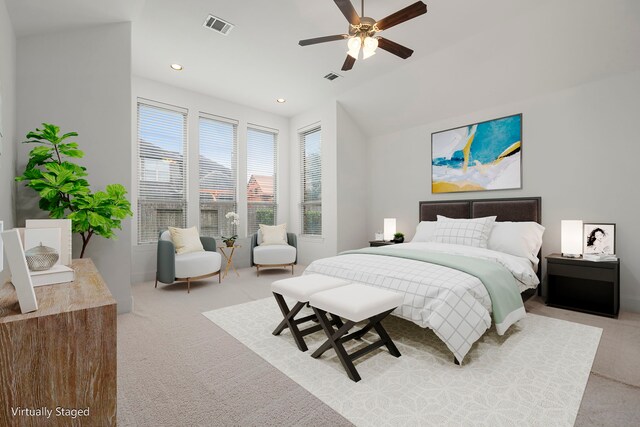 bedroom featuring light colored carpet, ceiling fan, recessed lighting, and vaulted ceiling