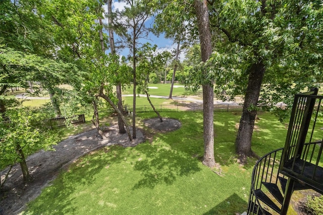 11 Twin Greens Ct, Houston, TX 77339 - view of home's community with fence and a lawn
