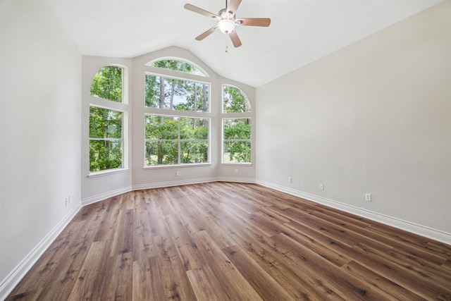 11 Twin Greens Ct, Houston, TX 77339 - unfurnished room featuring ceiling fan, lofted ceiling, a wealth of natural light, and wood finished floors