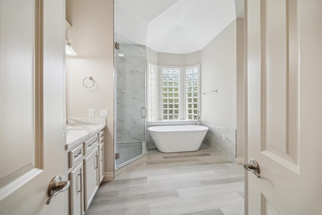 11 Twin Greens Ct, Houston, TX 77339 - full bathroom with a marble finish shower, vanity, and a freestanding tub