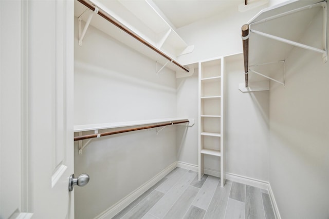 11 Twin Greens Ct, Houston, TX 77339 - spacious closet featuring light wood-style flooring