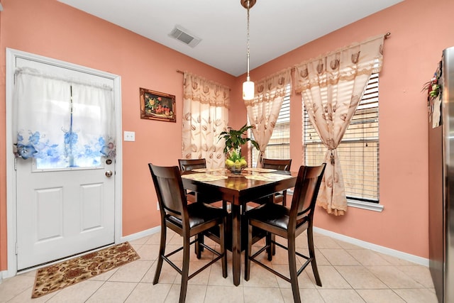 20115 Sunflower Chase Dr, Katy, TX 77449 - dining space featuring plenty of natural light, baseboards, and light tile patterned flooring