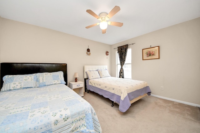20115 Sunflower Chase Dr, Katy, TX 77449 - bedroom with light carpet, baseboards, and ceiling fan