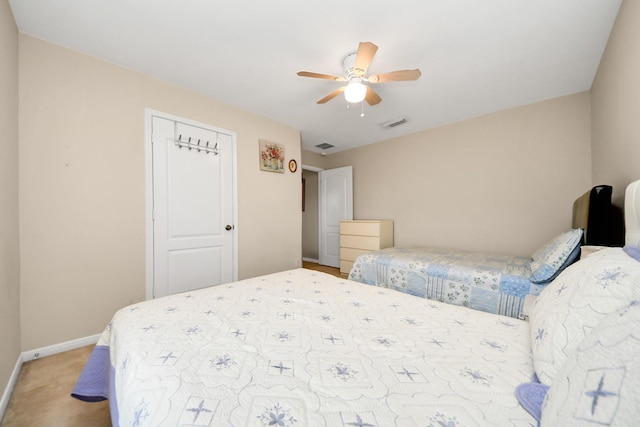20115 Sunflower Chase Dr, Katy, TX 77449 - bedroom with baseboards, a ceiling fan, and light colored carpet