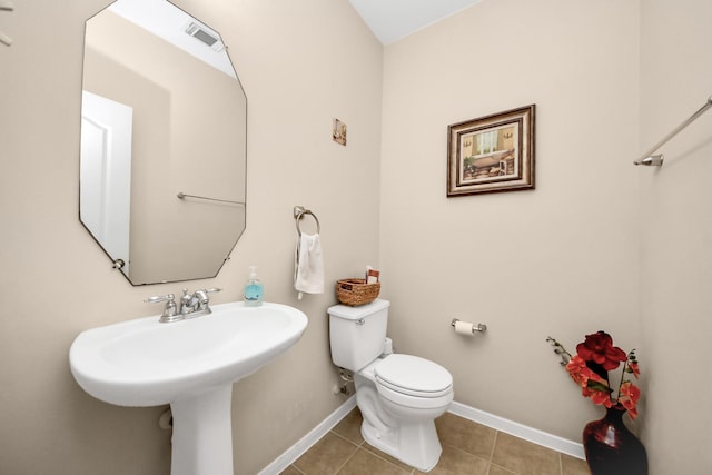 20115 Sunflower Chase Dr, Katy, TX 77449 - bathroom with toilet, tile patterned floors, and baseboards