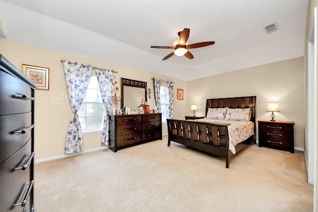 20115 Sunflower Chase Dr, Katy, TX 77449 - bedroom with light carpet, baseboards, and a ceiling fan