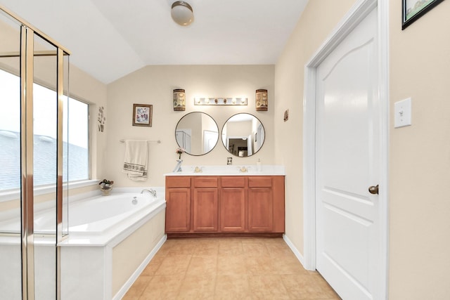 20115 Sunflower Chase Dr, Katy, TX 77449 - full bathroom featuring a garden tub, vaulted ceiling, a shower stall, double vanity, and tile patterned flooring