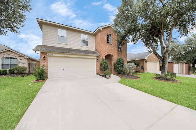 20115 Sunflower Chase Dr, Katy, TX 77449 - traditional-style home featuring an attached garage, driveway, brick siding, and a front yard