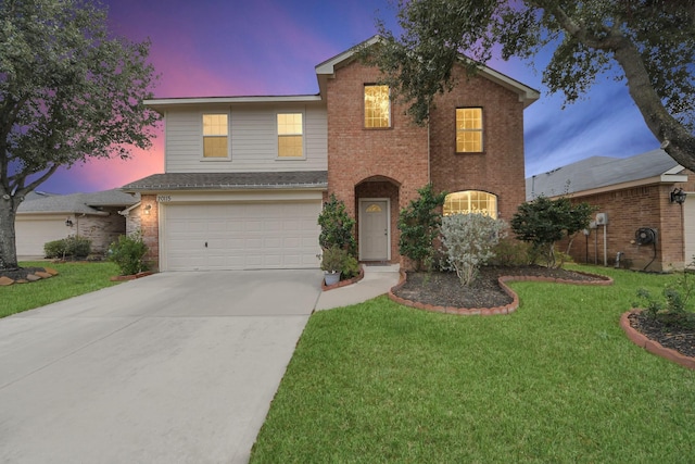 20115 Sunflower Chase Dr, Katy, TX 77449 - traditional-style house with driveway, brick siding, an attached garage, and a front lawn