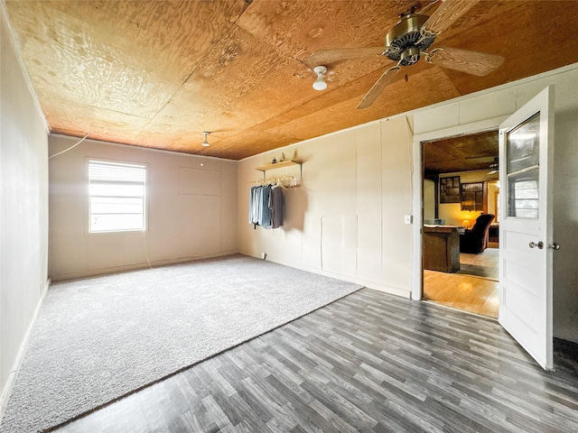 6710 County Road 203, Liverpool, TX 77577 - spare room with baseboards, wood finished floors, and a ceiling fan
