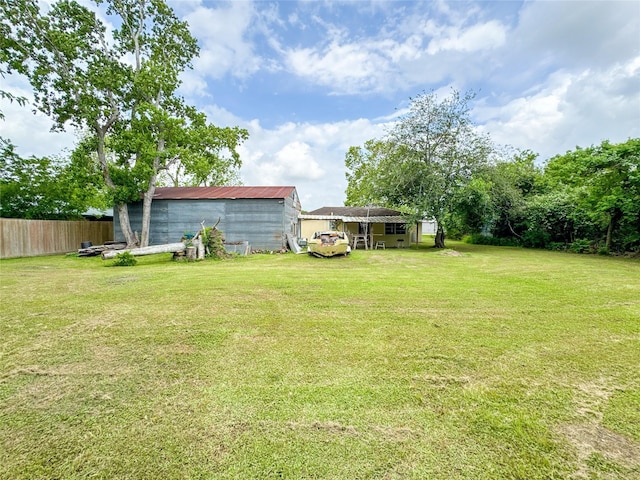 6710 County Road 203, Liverpool, TX 77577 - view of yard featuring an outdoor structure, a pole building, and fence