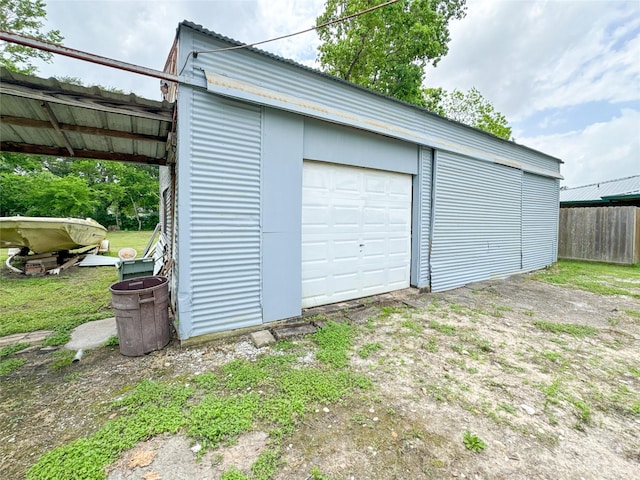 6710 County Road 203, Liverpool, TX 77577 - detached garage featuring fence