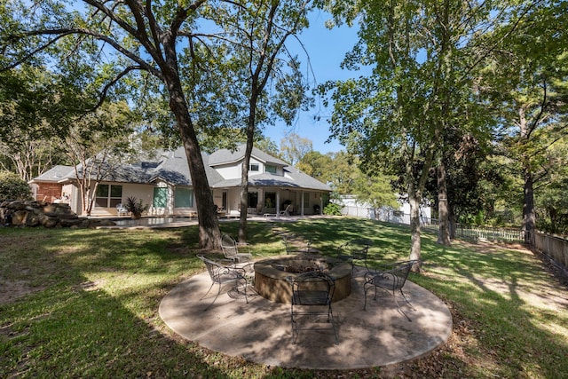 20111 Hilltop Ranch Dr, Montgomery, TX 77316 - view of yard with an outdoor fire pit, a patio, and fence