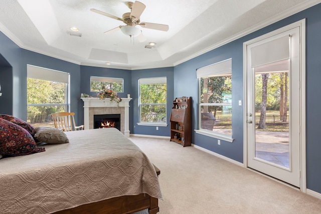20111 Hilltop Ranch Dr, Montgomery, TX 77316 - bedroom with baseboards, access to outside, a tray ceiling, and carpet floors