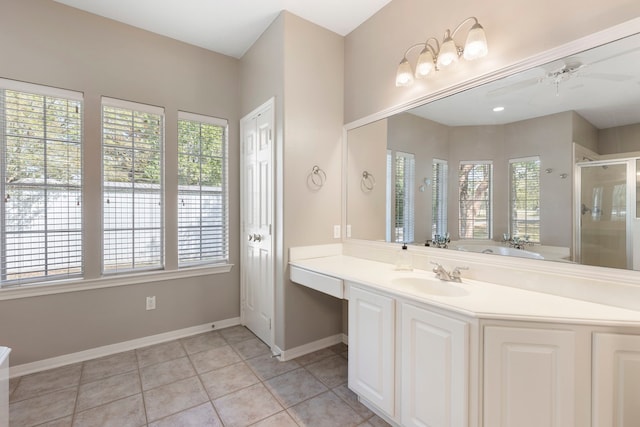 20111 Hilltop Ranch Dr, Montgomery, TX 77316 - bathroom with a stall shower, a garden tub, a ceiling fan, and a healthy amount of sunlight