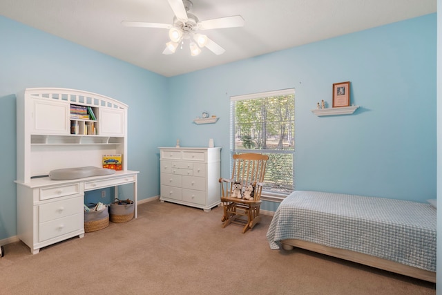 20111 Hilltop Ranch Dr, Montgomery, TX 77316 - bedroom with baseboards, a ceiling fan, and light colored carpet