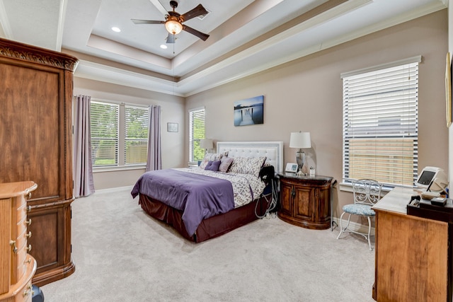 5603 Forest Cove Dr, Dickinson, TX 77539 - bedroom with light colored carpet, recessed lighting, crown molding, a tray ceiling, and baseboards