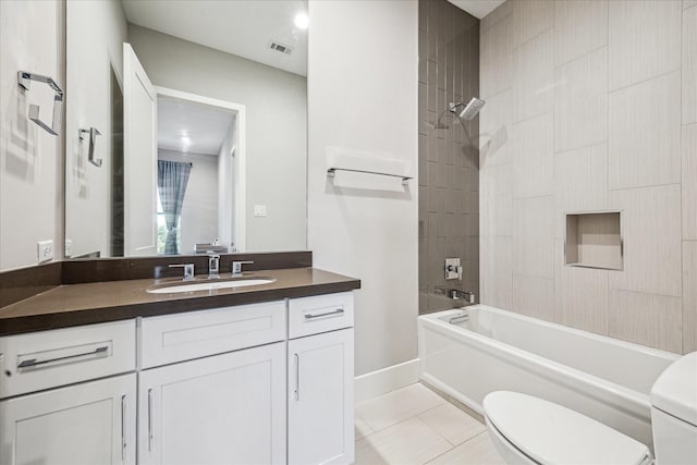 308 Willard, Houston, TX 77006 - full bathroom featuring toilet, vanity, washtub / shower combination, tile patterned flooring, and baseboards