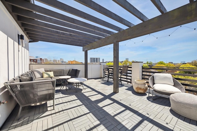 deck with a pergola and an outdoor living space
