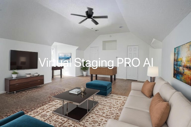living room featuring a ceiling fan, wood finished floors, and vaulted ceiling