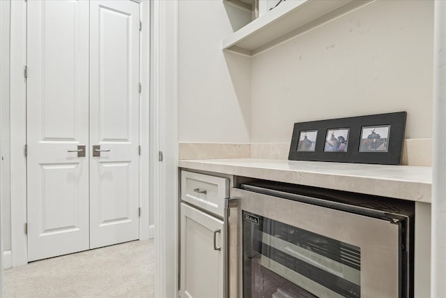 823 Blackshire Ln, Houston, TX 77055 - bar featuring light carpet and beverage cooler