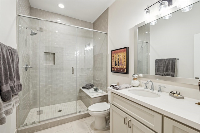 823 Blackshire Ln, Houston, TX 77055 - full bathroom featuring toilet, a stall shower, tile patterned flooring, vanity, and recessed lighting