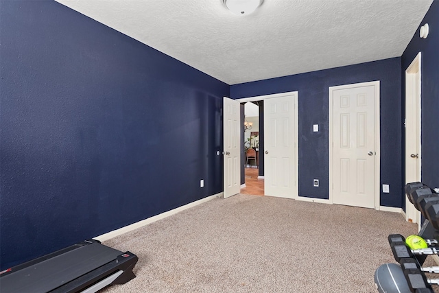 4407 Iron Creek Ct, Fresno, TX 77545 - bedroom with carpet floors, baseboards, and a textured ceiling